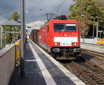 186 333-1 DB-Schenker kommt die Kohlscheider-Rampe hoch aus Richtung Neuss,Herzogenrath mit einem Schrottzug aus Köln-Kalk(D) nach Genk-Goederen(B) und fährt durch Kohlscheid in Richtung Richterich,Laurensberg,Aachen-West. 
Aufgenommen vom Bahnsteig 2 in Kohlscheid. 
Bei Sonne und Regenwolken am Nachmittag vom 24.9.2018.
