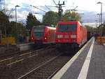 Ein Nachschuss von der 185 392-8 DB  und schiebt einen Schrottzug aus Köln-Kalk(D) nach Genk-Goederen(B). 
Aufgenommen vom Bahnsteig 2 in Kohlscheid. 
Bei schönem Herbstwetter am Nachmittag vom 22.10.2018.