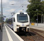 Ein Holländischer Regionalzug aus Maastricht(NL) nach Aachen-Hbf(D) und kommt die Kohlscheider-Rampe hoch aus Richtung Herzogenrath und fährt durch Kohlscheid in Richtung