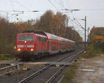 111 191 DB kommt die Kohlscheider-Rampe hoch aus Richtung Neuss,Herzogenrath mit dem RE4 aus Dortmund-Hbf nach Aachen-Hbf und fährt durch Kohlscheid in Richtung Richterich,Laurensberg,Aachen-West,Aachen-Schanz,Aachen-Hbf. 
Aufgenommen vom Bahnsteig 1  in Kohlscheid. 
Bei Regenwetter am Nachmittag vom 27.11.2019.