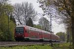 RE10425 mit Schublok 111 147-5 nach Dortmund am Km 25.4 kurz vor dem Bahnhof Geilenkirchen, 28.4.10