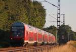 RE10437 aus Aachen nach Dortmund mit +15 und 111 012 am Zugschluss am Km 26.0 kurz vor dem Halt Geilenkirchen, 18.7.10
