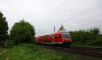 Ein RE4 von Aachen-Hbf-Dortmund-Hbf und am Zugende ist die 111 116 DB kommt aus Richtung Aachen-West,Laurensberg,Richterich, und fährt in Richtung