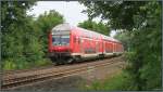 Unterwegs nach Aachen,der RE 4 (Wupper Express) im Gleisbogen bei Rimburg (Übach Palenberg) auf der Kbs 485 am 16.06.14.