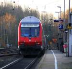 Ein Nachschuss vom RE4 aus Dortmund-Hbf nach Aachen-Hbf und  fährt durch Kohlscheid in Richtung Richterich,Laurensberg,Aachen-West.