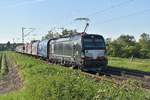 Am heutigen Abend kam die 193 623 mit einem Planwagenzug bei Kaarst Broicherseite gen Neuss Weißenberg gefahren.