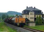 Hier ist 106 992 am 22.05.2009 mit DGS 91905 im Ortsgebiet von Raschau unterwegs.