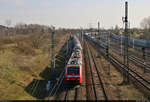 Kesselzug mit 152 007-1 (Siemens ES64F) und einer unbekannten kalten Schwesterlok unterwegs am Energiepark Dieselstraße in Halle (Saale) Richtung Bft Halle Gbf Süd.