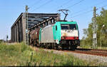 Kesselzug mit 186 244-0 (91 51 5270 004-2 PL-ATLU) überquert die Saale in Schkopau Richtung Merseburg Hbf.
