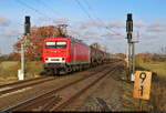 In letzter Sekunde, bevor das Sonnenlicht endgültig verschwand, kommt 156 001-0 mit ihren Kesselwagen an der Saalebrücke bei Schkopau Richtung Merseburg Hbf vorbei.
