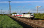 Nachschuss auf die IC2-Einheit 4900 mit Schublok 147 573-0 in Großkorbetha.