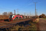Mit Getreidewagen und im Diesel-Modus fährt 2159 227-8 (Stadler Eurodual) am kalten, aber klaren letzten November-Tag durch Großkorbetha Richtung Weißenfels.