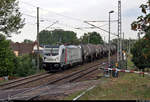 Kesselzug mit 187 506-1 der Akiem S.A.S., vermietet an die CTL Logistics GmbH, passiert die Anrufschranke in Zscherben, Angersdorfer Straße, auf der Bahnstrecke Halle–Hann.