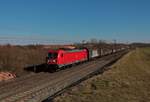 DB Cargo Bombardier Traxx 187 138-3 mit gemischten Güterzug in Nieder Mörlen auf der Main Weser Bahn am 07.03.21 