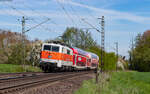 111 111	mit der RB 99031 (Marburg(Lahn) – Gießen) bei Niederwalgern 3.5.23  