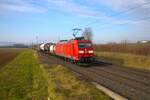 DB Cargo Bombardier Traxx 185 108-8 mit Mischer bei Nieder-Mörlen auf der Main Weser Bahn am 08.02.25