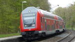 Ein RE nach Würzburg erreicht den Haltepunkt Hanau Wilhelmsbad.
