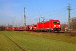 DB Cargo Bombardier Traxx 185 291-2 mit leeren Autotransportzug in Dettingen am Main (Bayern) am 20.01.26