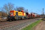 BBL Logistik Vossloh Rolling Stock DE18 (4185 185-7) mit Schotterzug in Maintal Ost am 02.03.26