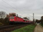 DB Regio 143 321-8 mit der RB 55 bei Maintal Ost.