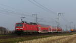 143 267 zieht eine RB75 gen Wiesbaden und wurde hier zwischen Weiterstadt und Klein-Gerau fotografiert.