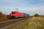 DB Cargo Bombardier Traxx 185 365-4 mit einen KLV Zug in Altheim bei Dieburg (Hessen) am 22.02.23
