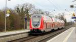 446 023 durchfährt als 4568 (RE 70) nach Frankfurt den Haltepunkt Bobstadt. Aufgenommen am 12. Januar 2020.
