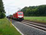 186 334-9 zieht einen gemischten Gterzug am 05.06.2011 bei Landstuhl in richtung Saarbrcken