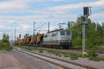 Nach langer Zeit konnte ich am 09.05.2026 die 151 161-7 fotografieren. Hier passiert sie mit dem DGS 91311 den Anschluss des ehemaligen Kraftwerks Ensdorf 