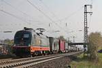 Mit dem  van Dijk -Containerzug nach Rheinhausen, fuhr am Nachmittag des 11.04.2019 die HCTOR 242.504 (182 504-1)  MR POTATO HEAD  südlich vom Haltepunkt Auggen über die Rheintalbahn in