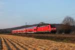 Mit einem RE (Offenburg - Basel Bad Bf) fuhr am Abend des 27.03.2020 die 146 213-4 bei Sexau am Schwarzwald vorbei über die Rheintalbahn in Richtung Denzlingen.