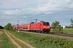 Mit ihrem RE (Freiburg (Brsg) Hbf - Basel Bad Bf) fuhr am späten Nachmittag des 03.05.2020 die Freiburger 146 233-2 südlich von Buggingen über die Rheintalbahn in Richtung Müllheim