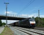 ES 64 F4 - 111 mit einem Papierzug Richtung Italien am 02.07.11 bei der langsamen Durchfahrt durch den Bahnhof Mllheim (Baden).