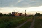 151 144-3 mit einem KLV-Zug in den ersten Sonnenstrahlen des 07.07.12 bei Hgelheim.