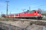 111 064 mit der RB 26579 nach Neuenburg (Baden) bei der Einfahrt in den Bahnhof Mllheim (Baden).