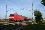 185 064-3 mit einem Kesselzug am 20.10.12 bei Buggingen.