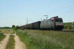 185 597-2 mit einem KLV-Zug am 05.06.13 nahe des Mllheimer (Mllheim (Baden)) Stadtteils Hgelheim unterwegs Richtung Norden.