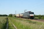 ES 64 F4-083 mit einem gemischten KLV-Zug im Abendelicht des 06.06.13 sdlich vom Hp Buggingen.