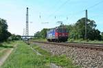 421 393-0 als Lz gen Norden am Vormittag des 15.08.13 bei der langsamen Durchfahrt des Bahnhofs Orschweier.