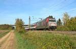 101 144 mit dem ber 60 Minuten verspteten EC 9 von Hamburg Altona nach Chur HB am Nachmittag des 26.10.13 bei Hgelheim.