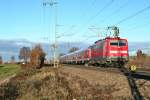 111 054 mit der RB 26566 von Neuenburg (Baden) nach Freiburg (Breisgau) Hbf am Nachmittag des 07.12.13 beim Verlassen des Bahnhof Mllheim (Baden).