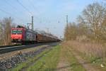 482 000-7 mit einem Autozug gen Sden am spten Nachmittag des 27.03.14 im Bahnhof Heitersheim.