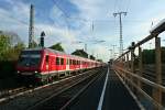 50 80 80 35-156-4 an der Spitze einer RB von Schliengen nach Offenburg am Nachmittag des 17.04.14 im Bahnhof Mllheim (Baden).