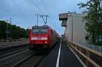 146 236-5 mit einem frhmorgendlichen RE von Schliengen nach Offenburg am 18.04.14 beim Halt in Mllheim (Baden).