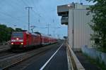 146 113-6 mit einem RE von Offenburg nach Schliengen am frhen Morgen des 23.05.14 beim Verlassen des Bahnhofs Mllheim (Baden).