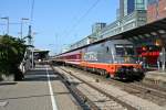 242 502 mit dem Pilger-Sonderzug DPE 13487 von Ulm ber Basel nach Lourdes am nachmittag des 08.06.14 bei der Einfahrt in Freiburg (Breisgau) Hbf.