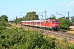 111 061 mit einer abendlichen RB nach Offenburg am 25.06.14 beim Anflug auf den Haltepunkt Buggingen.