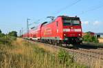 146 115 mit einer RB von Offenburg nach Mllheim (Baden) am Abend des 25.06.14 kurz nach dem Halt in Buggingen.