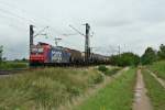 482 018-9 mit dem 49069 von (Ludwigshafen BASF Ubf-)Karlsruhe Gbf nach Basel SBB Rbf am Nachmittag des 30.07.14 westlich von Hgelheim.