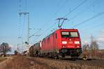 Mit einem gemischten Güterzug (Mannheim Rbf - Basel Bad Rbf) fuhr am 14.03.2018 die 185 313-4 nördlich von Müllheim (Baden) durchs Rheintal in Richtung Zielbahnhof.
